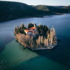 A small island surrounded by water.