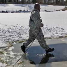 A person undergoing demanding outdoor training