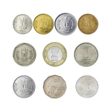 Indian rupee banknotes and coins.