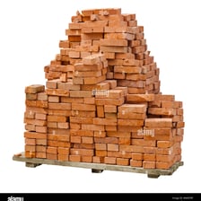 Stack of red clay bricks used as a building material