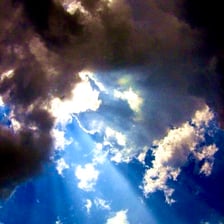 Dark clouds creating an ominous scene often used to symbolize an omen.