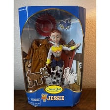 A classic doll displayed as a toy figurine.