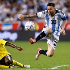 Lionel Messi playing in a football match.