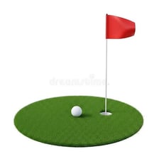 A golf ball beside a hole on a putting green marked by a flagstick.