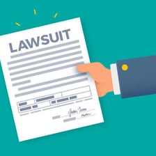 A person submitting legal documents at a courthouse