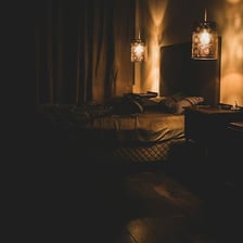 A room illuminated by weak, subdued light