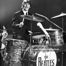 Ringo Starr performing as the Beatles’ drummer
