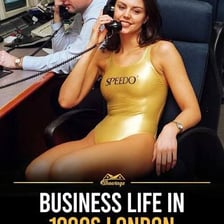 A young professional in business attire in a city financial district