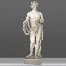 A classical statue depicting Bacchus, the Roman god of wine