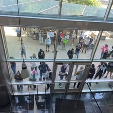 Police officers conducting a coordinated raid at a building