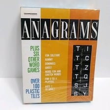 Letter tiles being rearranged to form a new word