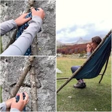 A person relaxing idly in a hammock.
