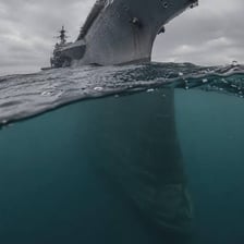 A ship showing its hull extending below the waterline