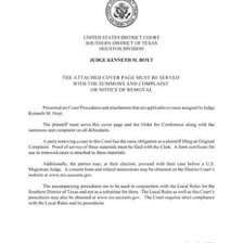 Legal documents associated with a court case in a courtroom.