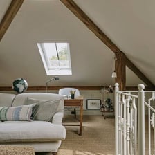 A room occupying the space beneath a pitched roof.