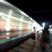 A train moving rapidly with motion blur