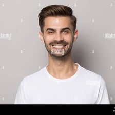 A person grinning broadly