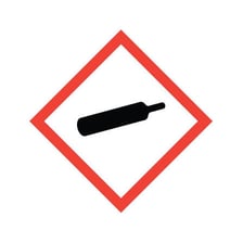 A laboratory bottle marked with a toxic hazard warning