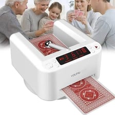 A card player secretly using an unfair tactic during a game.