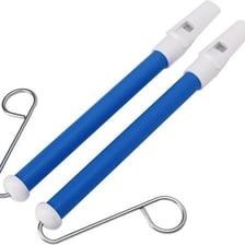 A simple whistle used as a wind instrument.