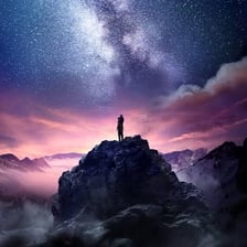 A person looking in awe at a spectacular landscape.