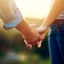 A romantic couple standing together