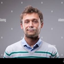 A person with an appealing, friendly expression.