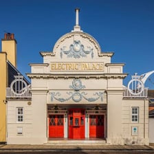 Exterior of a traditional British cinema building.