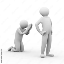 A person making an earnest pleading gesture