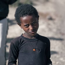 A young boy outdoors.