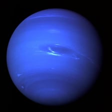A blue image of the planet Neptune.