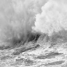 Large waves crashing during an intense storm