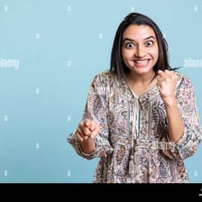 A cheerful person smiling in an optimistic mood