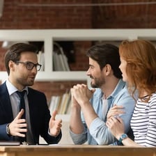 An advisor speaking with a client during a consultation