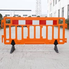 A barrier blocking a roadway.