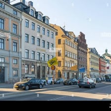 A Stockholm street scene with a Swedish flag