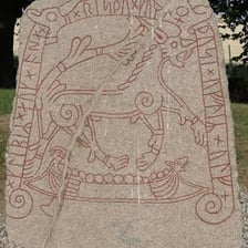 Runic symbols carved into an old stone