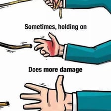 A hand pulling a rope sharply.