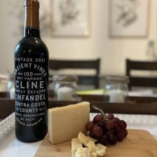 Cheese and wine shown undergoing maturation.