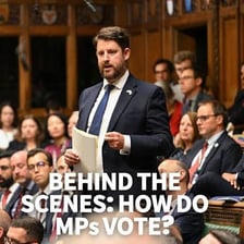 A formal assembly voting in favour.