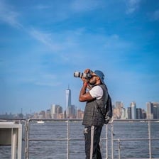 Tourists taking photographs while sightseeing