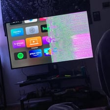 A television displaying black-and-white static interference