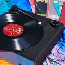 A vinyl record representing a successful hit recording.