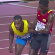 One athlete overtaking another in a race.