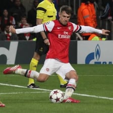 A football player kicking a ball