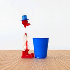 An object being lowered briefly into water
