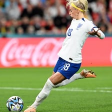 A football player kicking a ball