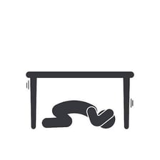 An object positioned beneath a table