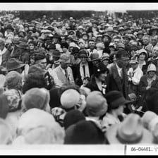 A well-known person being recognized by an admiring crowd.