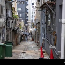 A narrow passage running between buildings.